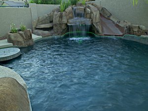 Custom pool and outdoor living space built by Saturn Pool Company in Arizona