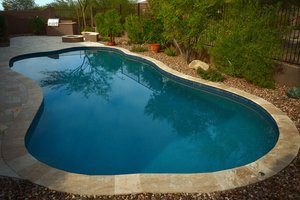 Custom concrete swimming pool built by Saturn Pool Company in Arizona
