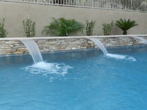 Custom concrete swimming pool built by Saturn Pool Company in Arizona