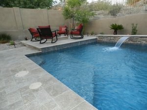 Backyard swimming pool and decking built by Saturn Pool Company in Arizona