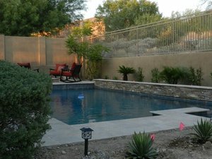 Custom concrete swimming pool built by Saturn Pool Company in Arizona