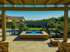 Custom pool and outdoor living space built by Saturn Pool Company in Arizona