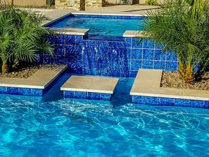 Custom concrete swimming pool built by Saturn Pool Company in Arizona