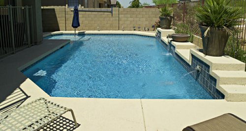 Custom pool and outdoor living space built by Saturn Pool Company in Arizona